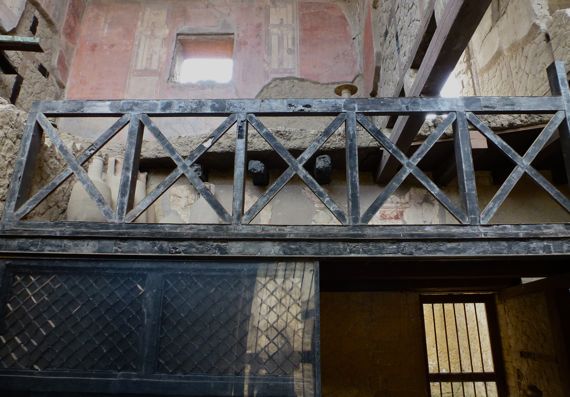 Herculaneum charred wood second story balcony screen