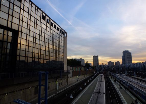 Montparnasse trainyard sunset reflected