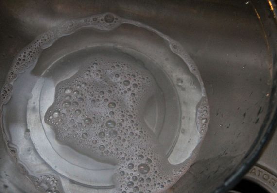 Bubbles in bowl in sink