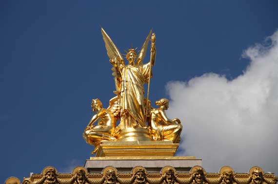 Golden rooftop statue paris island