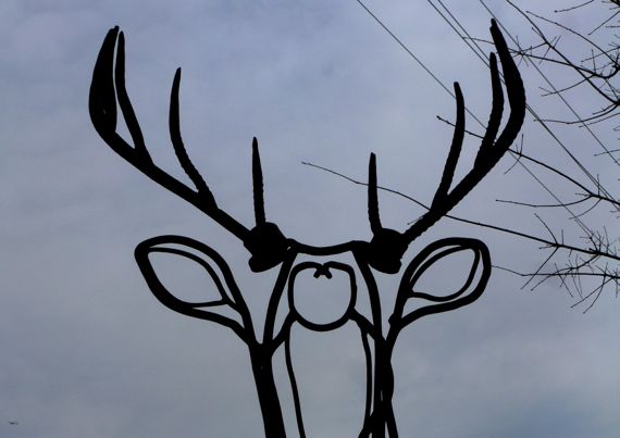 Stag statue against sky